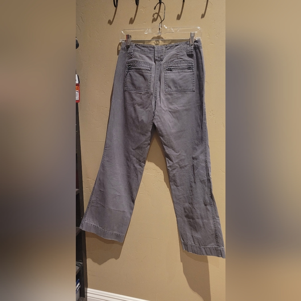 Grey straight leg pants.